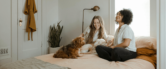 Couple with dog at home